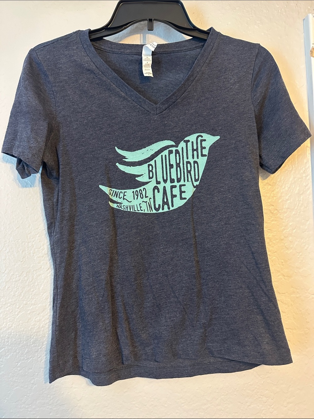 Women's Navy V-Neck Logo Tee from The Blue Bird Cafe in Nashville, TN